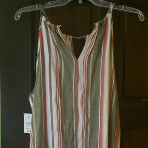 Summer dress, layered in the front, longer in the back. Tag still on it